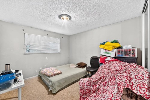 4940 Rundlewood Road Ne, Calgary, AB - Indoor Photo Showing Bedroom