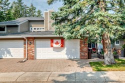 66 Woodmeadow Close SW Calgary, AB T2W 4L8