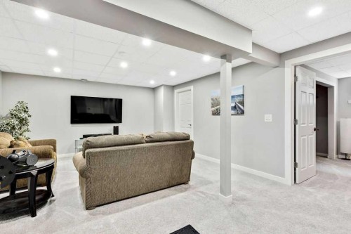 205 Aspenmere Way, Chestermere, AB - Indoor Photo Showing Basement