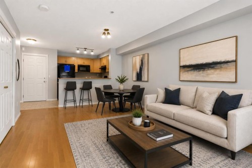 1102-70 Panamount Drive Nw, Calgary, AB - Indoor Photo Showing Living Room