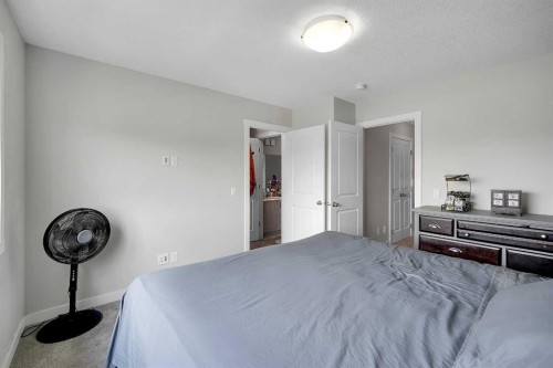42 Midtown Boulevard Sw, Airdrie, AB - Indoor Photo Showing Bedroom