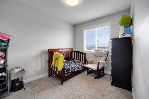 42 Midtown Boulevard Sw, Airdrie, AB - Indoor Photo Showing Bedroom