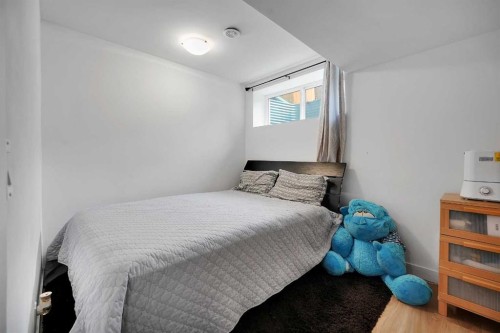 42 Midtown Boulevard Sw, Airdrie, AB - Indoor Photo Showing Bedroom