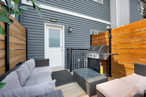 42 Midtown Boulevard Sw, Airdrie, AB - Outdoor With Deck Patio Veranda With Exterior