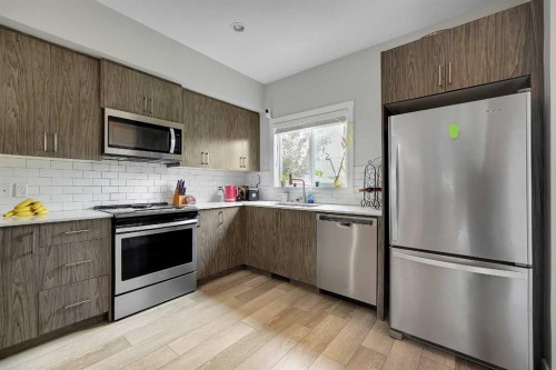 42 Midtown Boulevard Sw, Airdrie, AB - Indoor Photo Showing Kitchen