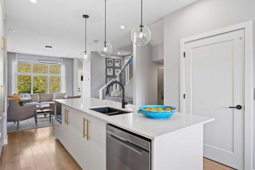 3044 85 Street Sw, Calgary, AB - Indoor Photo Showing Kitchen With Double Sink With Upgraded Kitchen