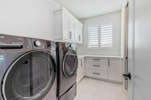 276 Cranbrook Point Se, Calgary, AB - Indoor Photo Showing Laundry Room
