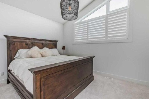 276 Cranbrook Point Se, Calgary, AB - Indoor Photo Showing Bedroom