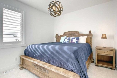 276 Cranbrook Point Se, Calgary, AB - Indoor Photo Showing Bedroom