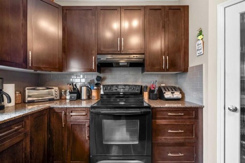 116 Drake Landing Loop, Okotoks, AB - Indoor Photo Showing Kitchen
