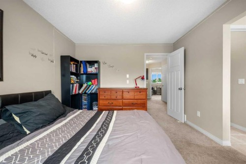 116 Drake Landing Loop, Okotoks, AB - Indoor Photo Showing Bedroom