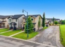 116 Drake Landing Loop, Okotoks, AB  - Outdoor With Facade 