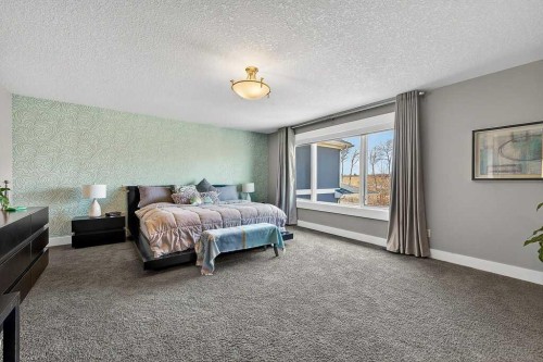 78 Aspen Cliff Close Sw, Calgary, AB - Indoor Photo Showing Bedroom