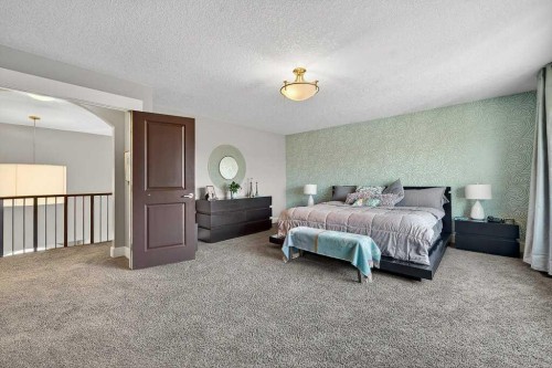 78 Aspen Cliff Close Sw, Calgary, AB - Indoor Photo Showing Bedroom