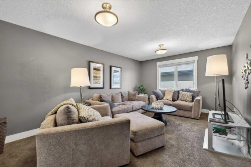 78 Aspen Cliff Close Sw, Calgary, AB - Indoor Photo Showing Living Room