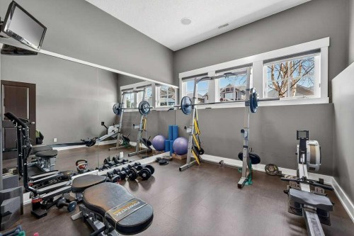 78 Aspen Cliff Close Sw, Calgary, AB - Indoor Photo Showing Gym Room