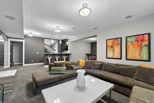 78 Aspen Cliff Close Sw, Calgary, AB - Indoor Photo Showing Living Room