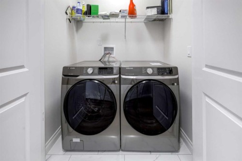 351 Baywater Common Sw, Airdrie, AB - Indoor Photo Showing Laundry Room