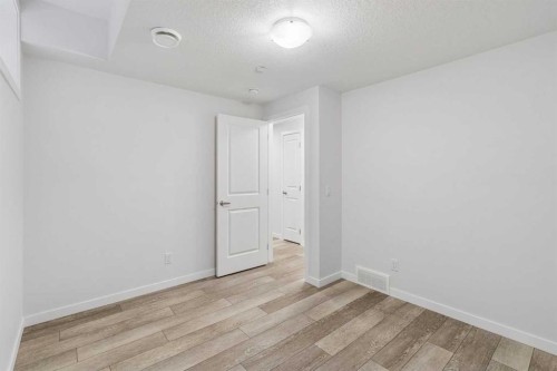 215 Lucas Terrace Nw, Calgary, AB - Indoor Photo Showing Other Room