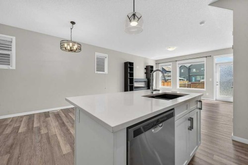 556 Belmont Heath Sw, Calgary, AB - Indoor Photo Showing Kitchen With Upgraded Kitchen