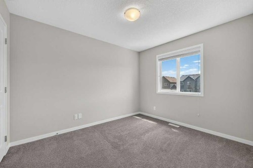 556 Belmont Heath Sw, Calgary, AB - Indoor Photo Showing Other Room