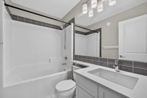 556 Belmont Heath Sw, Calgary, AB - Indoor Photo Showing Bathroom