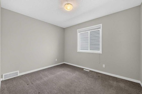 556 Belmont Heath Sw, Calgary, AB - Indoor Photo Showing Other Room