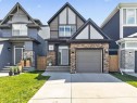 556 Belmont Heath Sw, Calgary, AB  - Outdoor With Facade 
