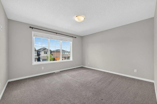 556 Belmont Heath Sw, Calgary, AB - Indoor Photo Showing Other Room