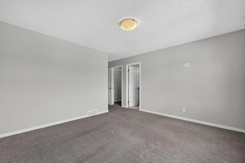 556 Belmont Heath Sw, Calgary, AB - Indoor Photo Showing Other Room