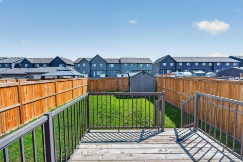 556 Belmont Heath Sw, Calgary, AB - Outdoor With Deck Patio Veranda