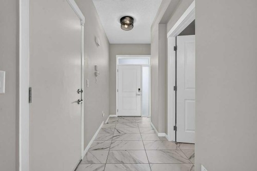 556 Belmont Heath Sw, Calgary, AB - Indoor Photo Showing Other Room