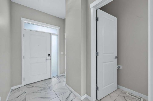 556 Belmont Heath Sw, Calgary, AB - Indoor Photo Showing Other Room