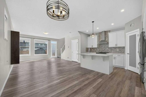 556 Belmont Heath Sw, Calgary, AB - Indoor Photo Showing Kitchen With Upgraded Kitchen