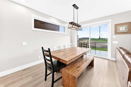 12 Willow Street, Cochrane, AB - Indoor Photo Showing Dining Room