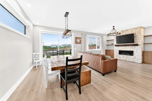12 Willow Street, Cochrane, AB - Indoor With Fireplace