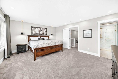 12 Willow Street, Cochrane, AB - Indoor Photo Showing Bedroom
