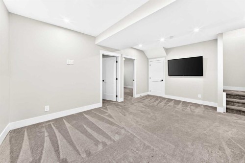 12 Willow Street, Cochrane, AB - Indoor Photo Showing Other Room