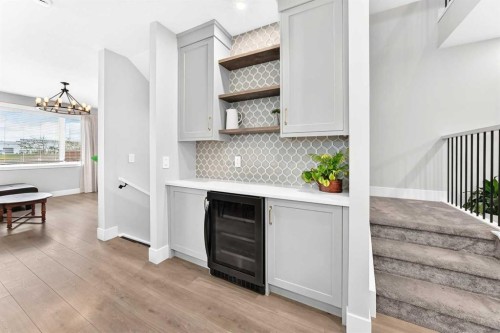 12 Willow Street, Cochrane, AB - Indoor Photo Showing Other Room