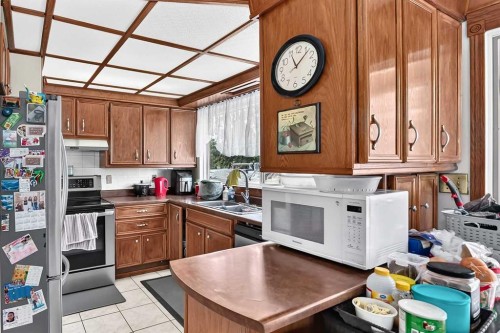 16501 106 Avenue Nw, Edmonton, AB - Indoor Photo Showing Kitchen With Double Sink