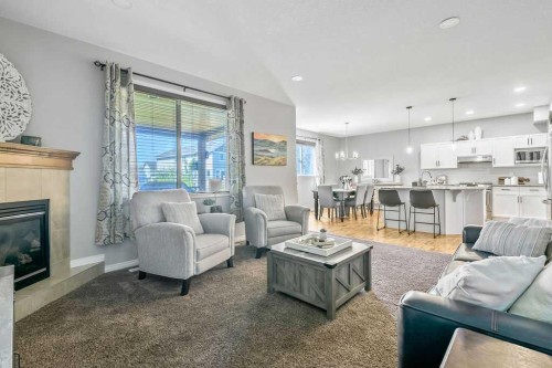 1034 Ranch Road, Okotoks, AB - Indoor Photo Showing Living Room With Fireplace