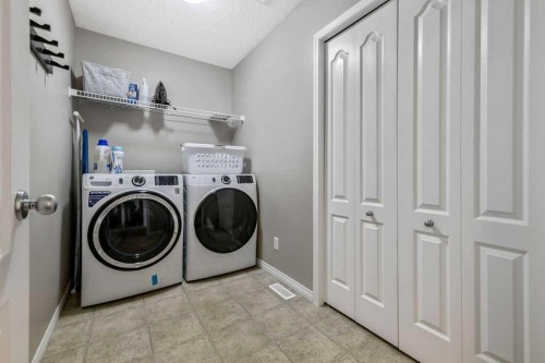 1034 Ranch Road, Okotoks, AB - Indoor Photo Showing Laundry Room