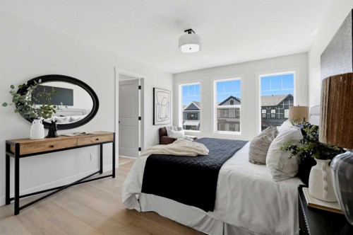 695 Buffaloberry Manor Se, Calgary, AB - Indoor Photo Showing Bedroom