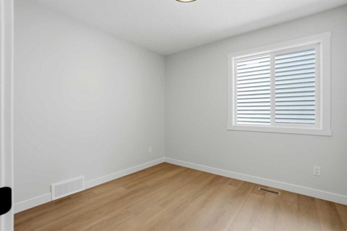 695 Buffaloberry Manor Se, Calgary, AB - Indoor Photo Showing Other Room