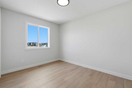 695 Buffaloberry Manor Se, Calgary, AB - Indoor Photo Showing Other Room