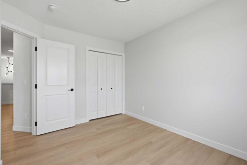695 Buffaloberry Manor Se, Calgary, AB - Indoor Photo Showing Other Room