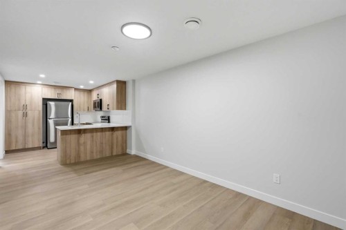 695 Buffaloberry Manor Se, Calgary, AB - Indoor Photo Showing Kitchen