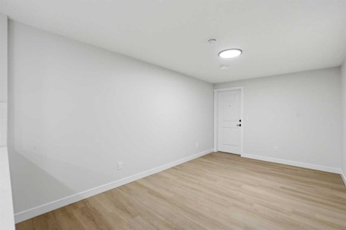 695 Buffaloberry Manor Se, Calgary, AB - Indoor Photo Showing Other Room