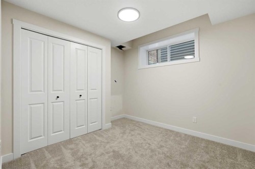 695 Buffaloberry Manor Se, Calgary, AB - Indoor Photo Showing Other Room