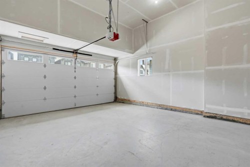 695 Buffaloberry Manor Se, Calgary, AB - Indoor Photo Showing Garage